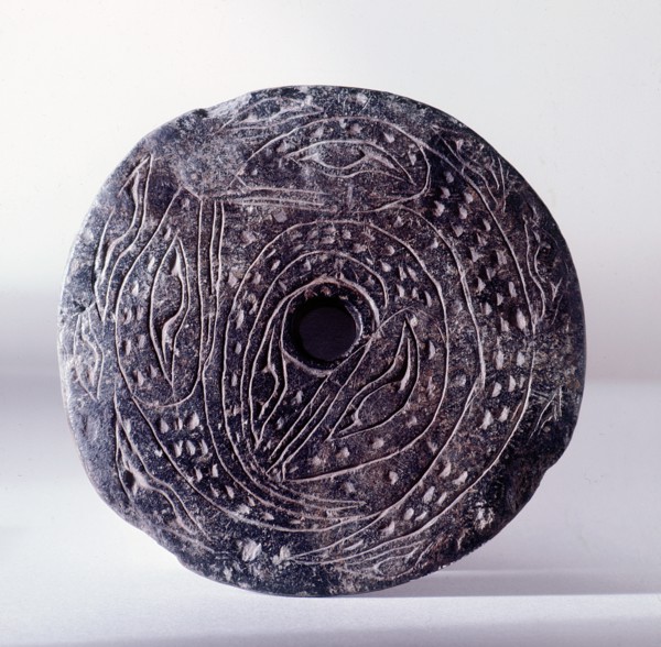 Spindle whorl, used by the Coast Salish during spinning to prevent the wool slipping from the spindle