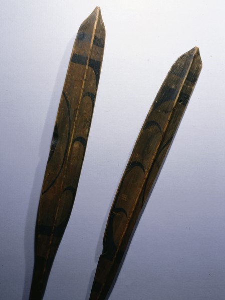 Single bladed paddles used to propel kayaks
