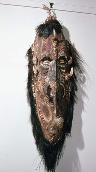Large shield shaped mask that represents a female clan specific spirit