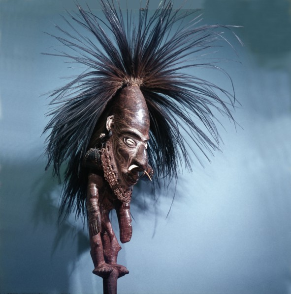 Figural stopper from a flute