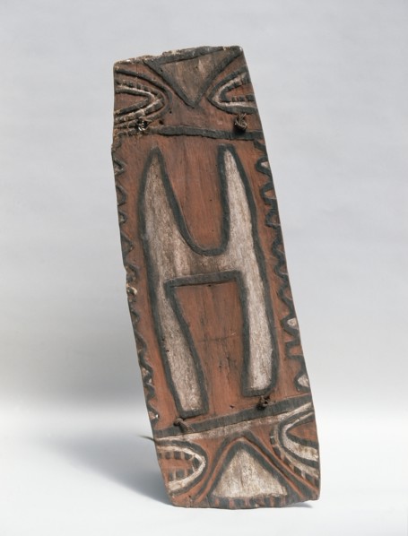 Shield with stylised low relief design