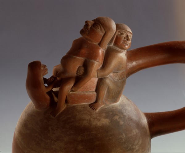 Mochica stirrup spouted jar showing birth scene