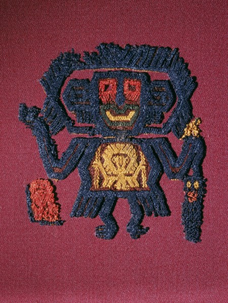 Nazca textile fragment in the form of a figure carrying a trophy head and staff
