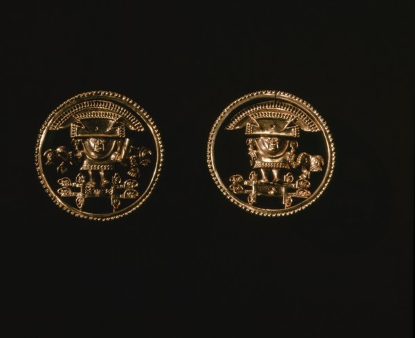 Elaborately cast gold discs, possibly earrings