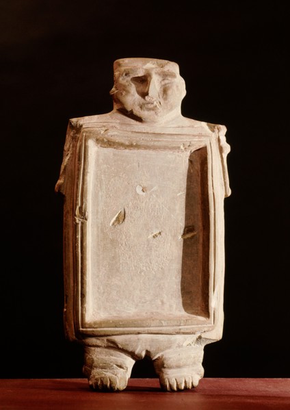 A flat dish modelled in the form of a nude woman