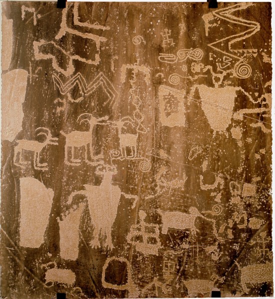 Petroglyphs depicting shamans and sheep