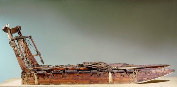 Polar Eskimos had very little wood so, in order to make this sled they had to combine several small pieces of wood and ivory, and lash them together with sealskin rope