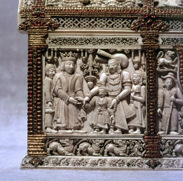 Detail of low relief carving on an ivory casket decorated with gold and rubies