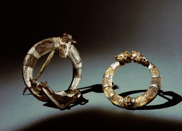 Two ring brooches