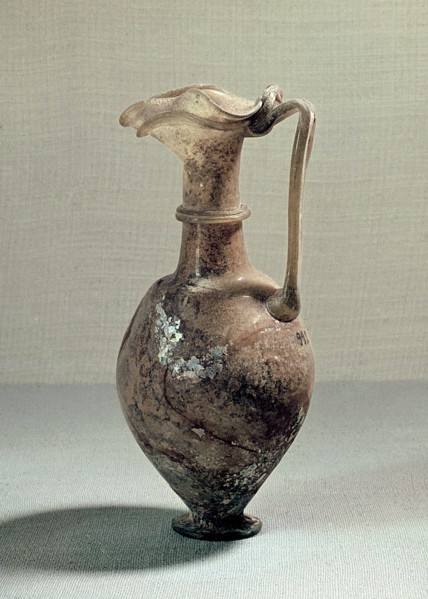 Glass vase with elaborate spout