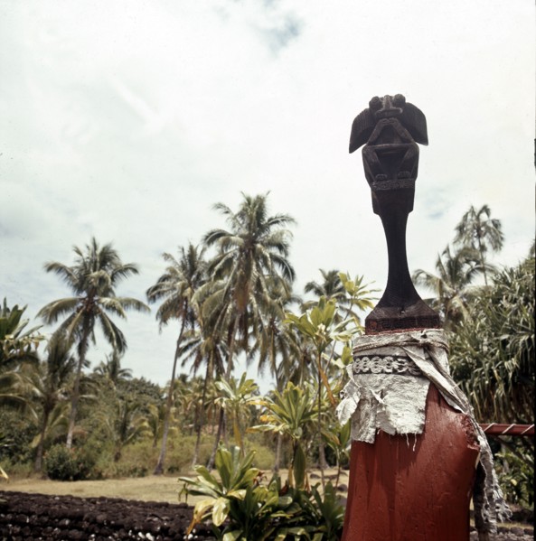 Figure of a god mounted on a pillar in the walled enclosure of the Marae Attahooroo, Tahiti