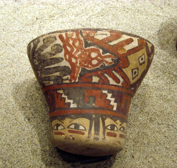 Polychrome ceramic kero showing octopus like creatures and human faces