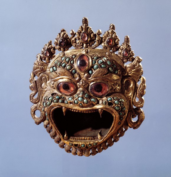 A holy water vessel in the form of a demonic face