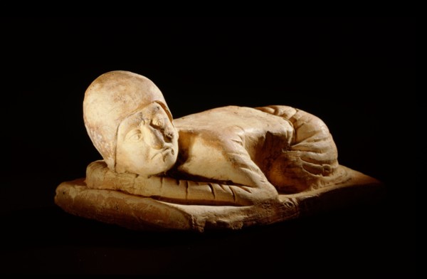 Tomb figure (miniature pillow) in the form of a kowtowing Persian trader