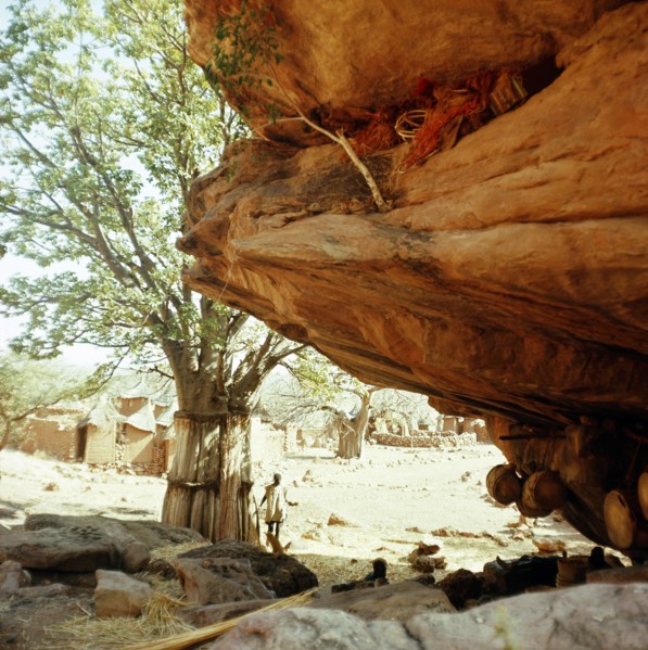 Niches at the base of the high cliffs above the village are used to store sacred masks and drums