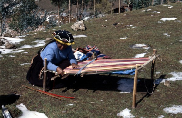 Quechua 'Inca' woman weaving on a horizontal single-heddle loom