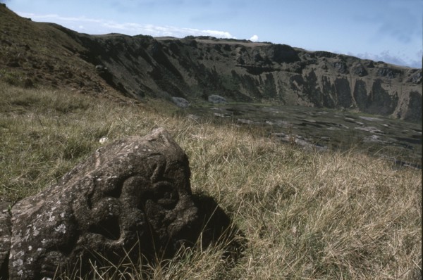 Bird-Man petroglyph by the edge of crater of Rano Kao volcano