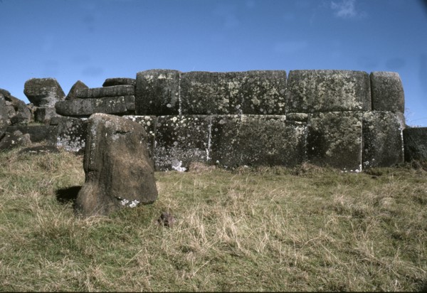 The so-called "Inca-style" masonry at Ahu Vinapu, with a half buried Moai head in the foreground