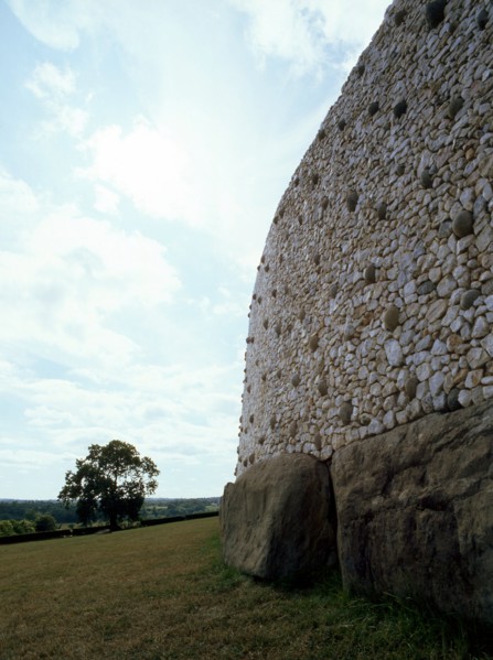 View of the stone walls that surround the heart-shaper mound covering the prehistoric passage tomb at Newgrange