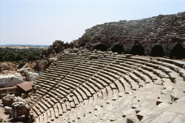 View of the upper rows of seats and arches of the supporting wall of the theatre at Side