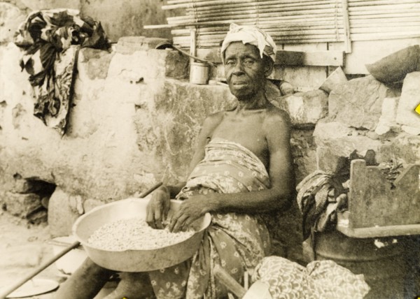 An elderly street vendor in Accra