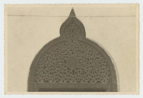 Top portion of ornately carved doorway