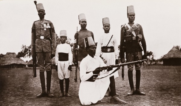 Six uniformed Sudanese soldiers armed with rifles
