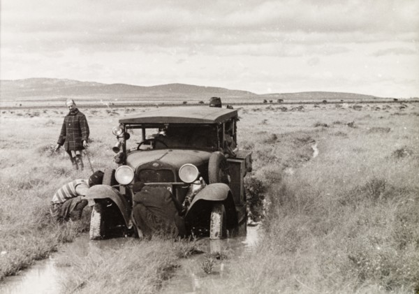 Car stuck in flooded plains