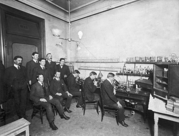 Scientists With Microscopes