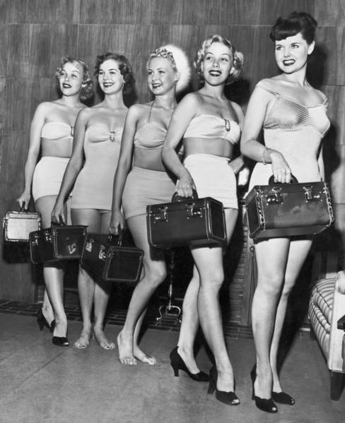 Five Women Pose With Bags