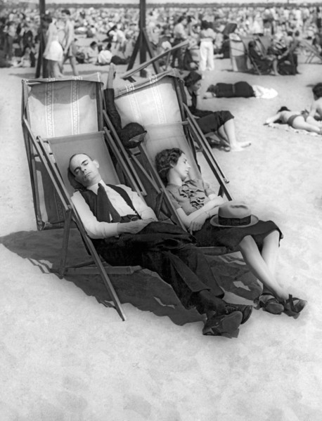 A Couple Sleeps At The Beach