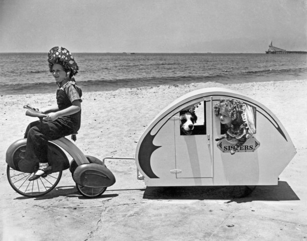 Venice, California:   July 7, 1938.
Two sisters do the beach tour along with their dog and cat.
