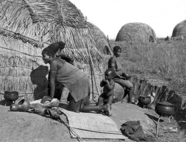Native Woman Kneading Bread