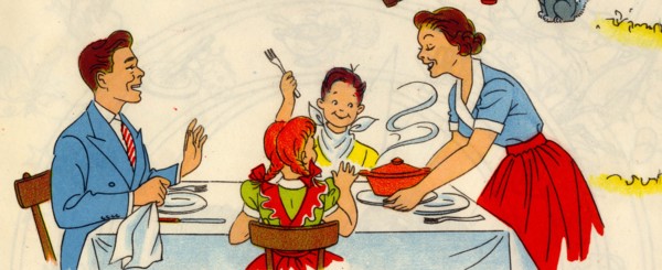Family at Table as Mom serves hot food