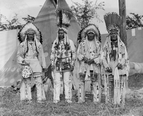 Four Native American Chiefs in Feathered War Bonnets & Buckskins as decorated Native Garb 1923