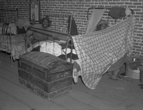 Black flood refugees in the Red Cross temporary infirmary at Forrest City, Arkansas 1936