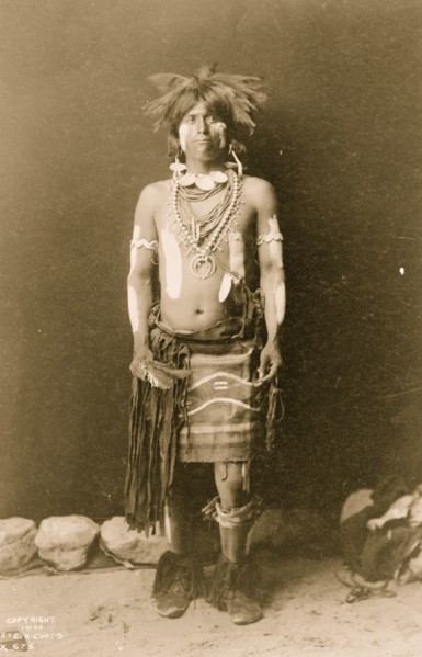 Snake dancer in costume 1900