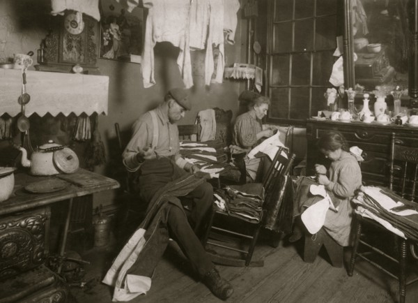 11:30 A.M. Jennie Rizzandi, 9 year old girl, helping mother and father finish garments in a dilapidated tenements, immigrants  1924
