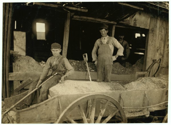A Boy (may be over 14) at Heavy Work. Shoveling Ore at Daisy Bell Mine, Aurora, Mo. 1908