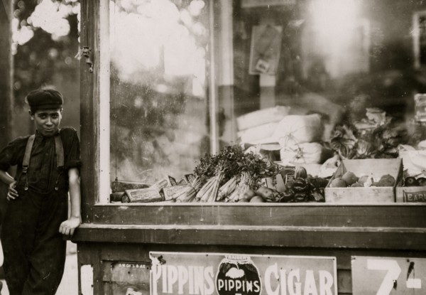 Portuguese immigrant boy works in folding-in room of the Wood Mill. Is an illiterate 1911