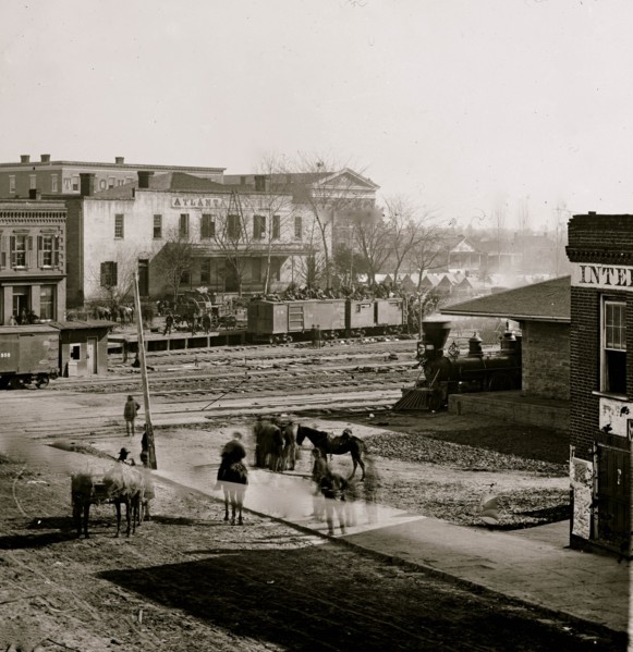 Atlanta, Ga. Soldiers on boxcars at railroad depot 1865