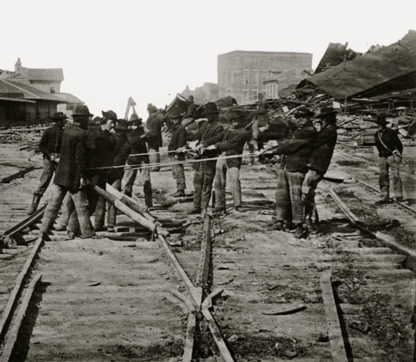 Atlanta, Georgia. Sherman's men tearing up railroad track 1864