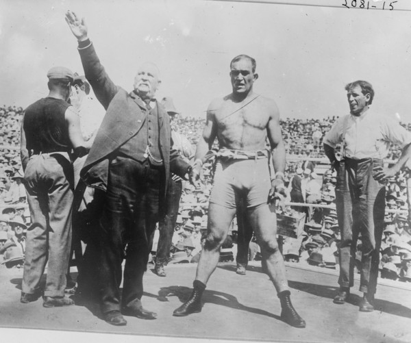 Boxer and announcer in boxing ring