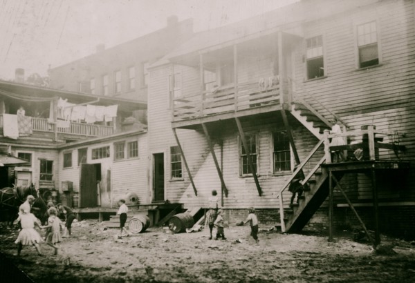 Cottage Street hovels down by the river in Easthampton, Mass., in which a great deal of home work is done on suspenders 1912