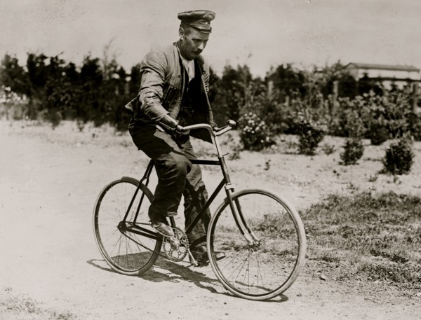 Crippled German soldier on bike
