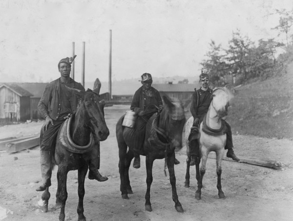 Going home, riding their horses after a day at the mine 1908