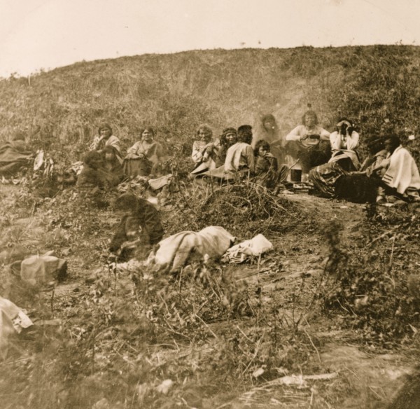 Group of Winnebago Indians on hillside 1870