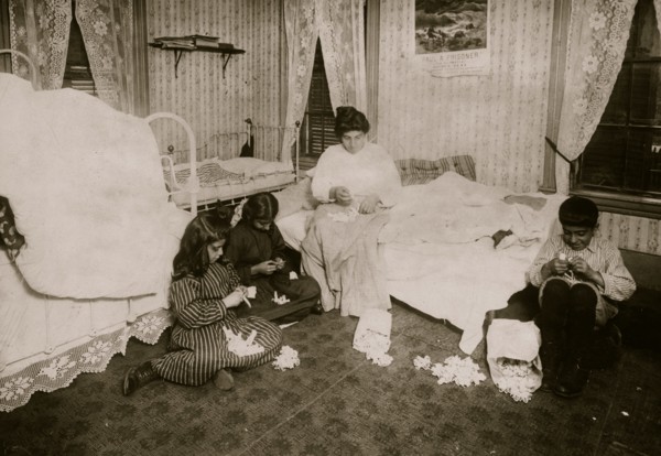 Home of Sarkis Bedrosian working on garter buttons. 1912