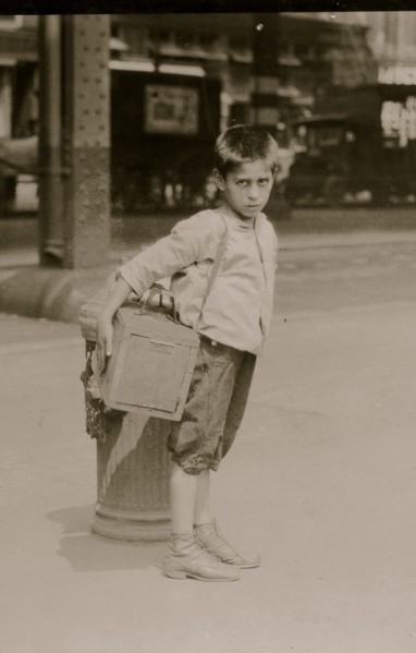Jimmie, a seven year old bootblack, working on Canal Street, N.Y. City - July 25, 1924. 1924