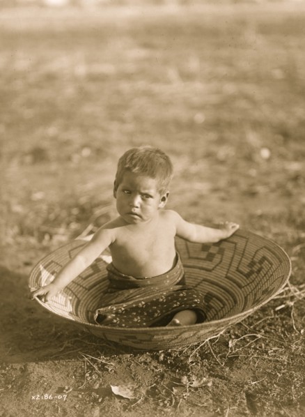 Toddler in Basket 1907